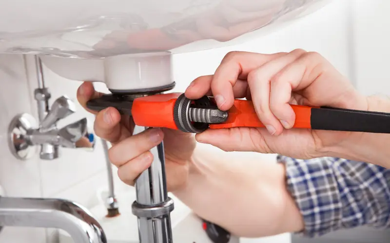 Plumber fitting pipework for a water softener